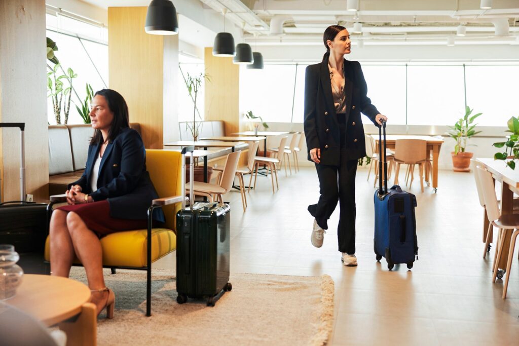 Traveler on the move in airport lounge Tempura