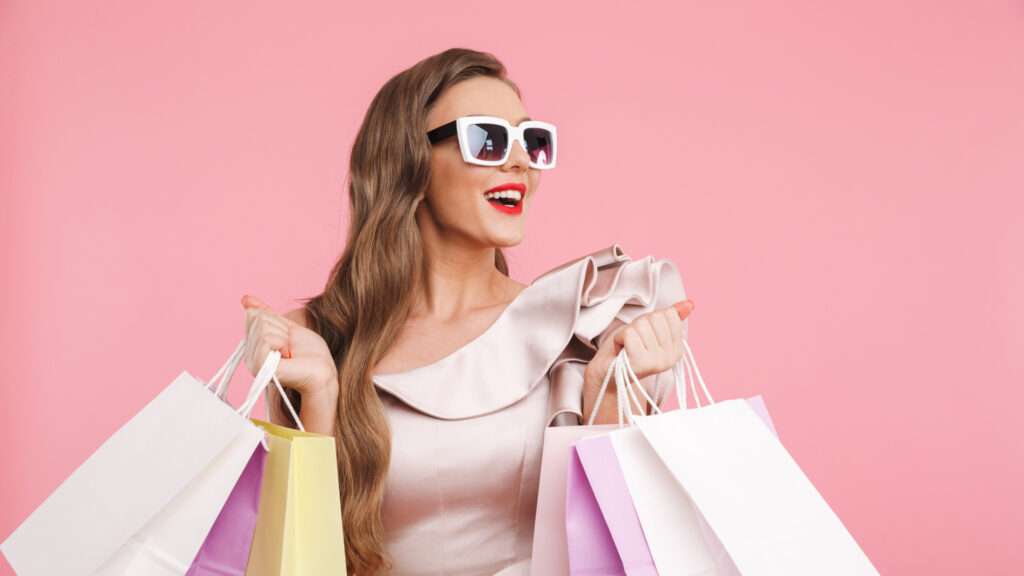 rich woman shopping bags iStock 1320144391