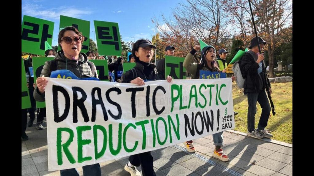 Climate activists march on a street to demand stro 1732730733746