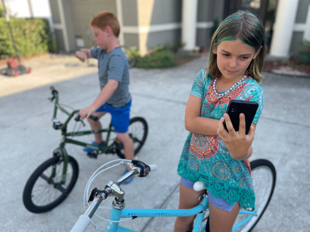 Kids looking at their Gabb devices