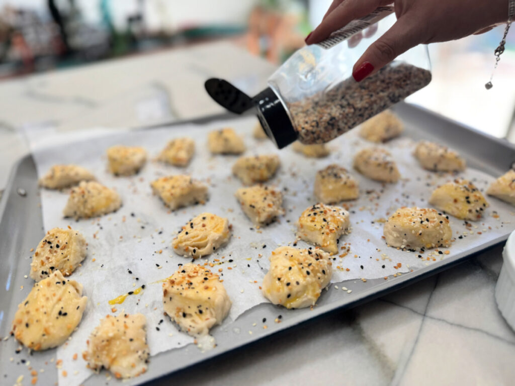 adding everything bagel seasoning to pretzel bites 1