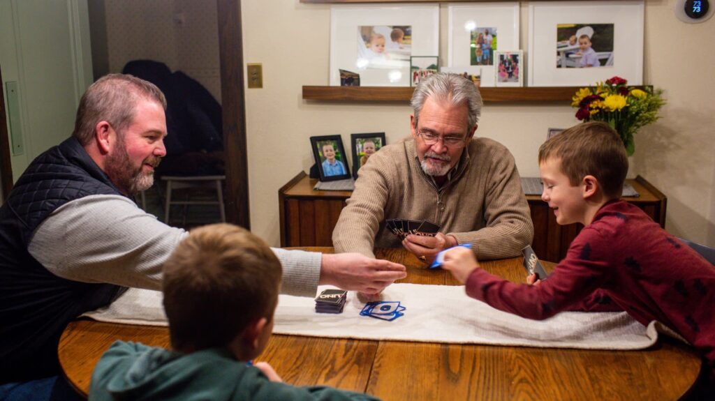 d07aed 20241213 four people play cribbage 2000