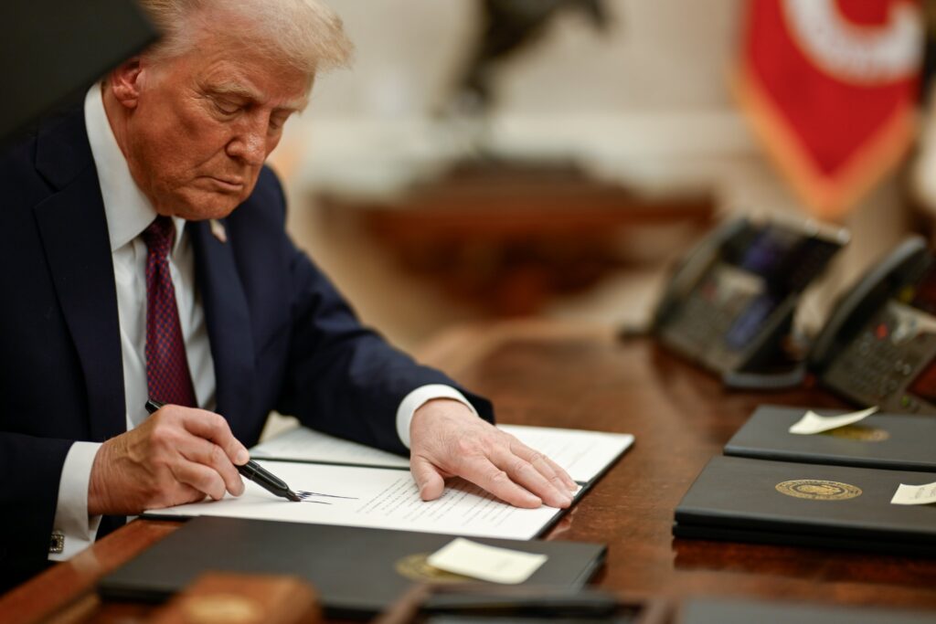 President Donald Trump signing executive orders 04