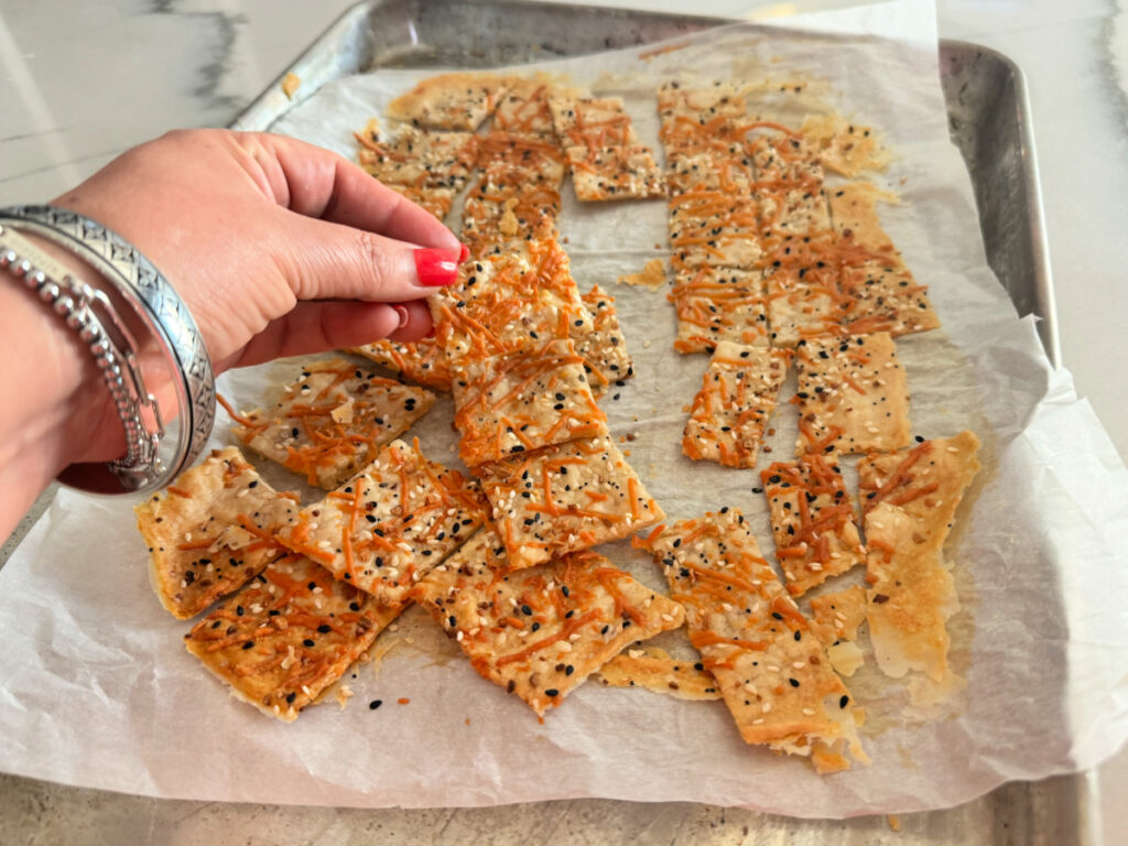 breaking apart sourdough crackers 1